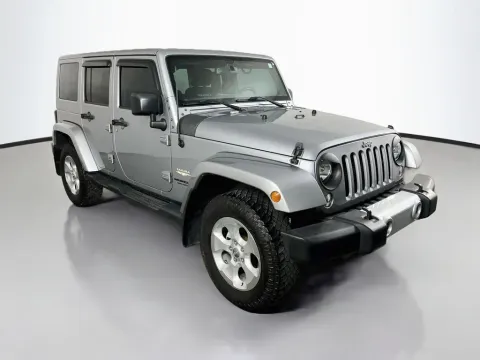 Another view of 2015 Jeep Wrangler Unlimited Sahara for sale in St. Charles, MO at Clement Supercenter