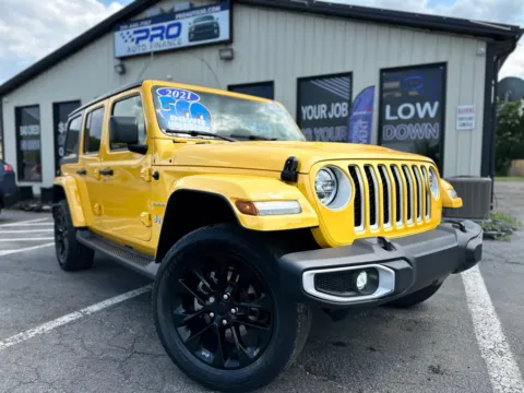Yellow 2021 JEEP WRANGLER UNLIMI SAHARA 4XE for sale in Crown Point, IN