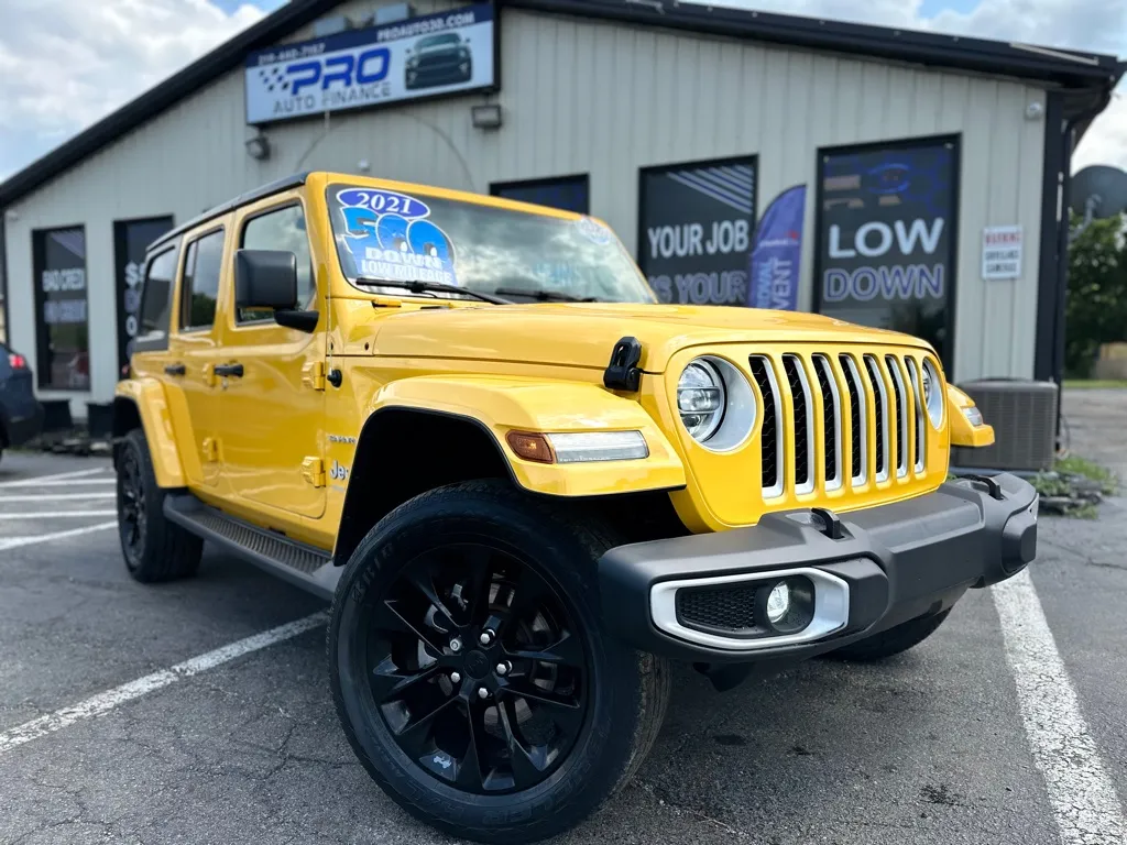 Yellow 2021 JEEP WRANGLER UNLIMI SAHARA 4XE for sale in Crown Point, IN