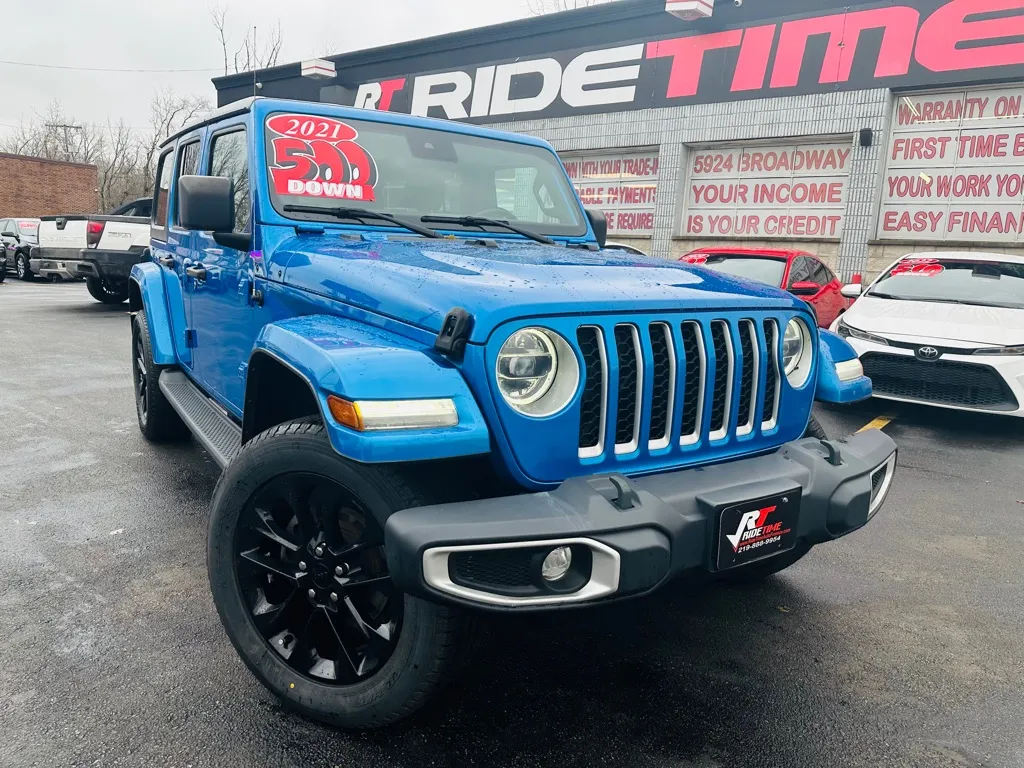 Blue 2021 JEEP WRANGLER UNLIMI SAHARA 4XE for sale in Merrillville, IN