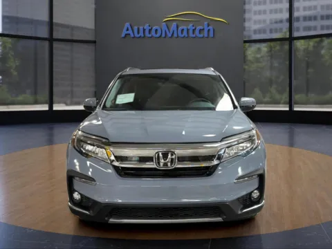 Photos of 2022 Honda Pilot Touring w/Rear Captain's Chairs for sale in Orem, UT at AutoMatch