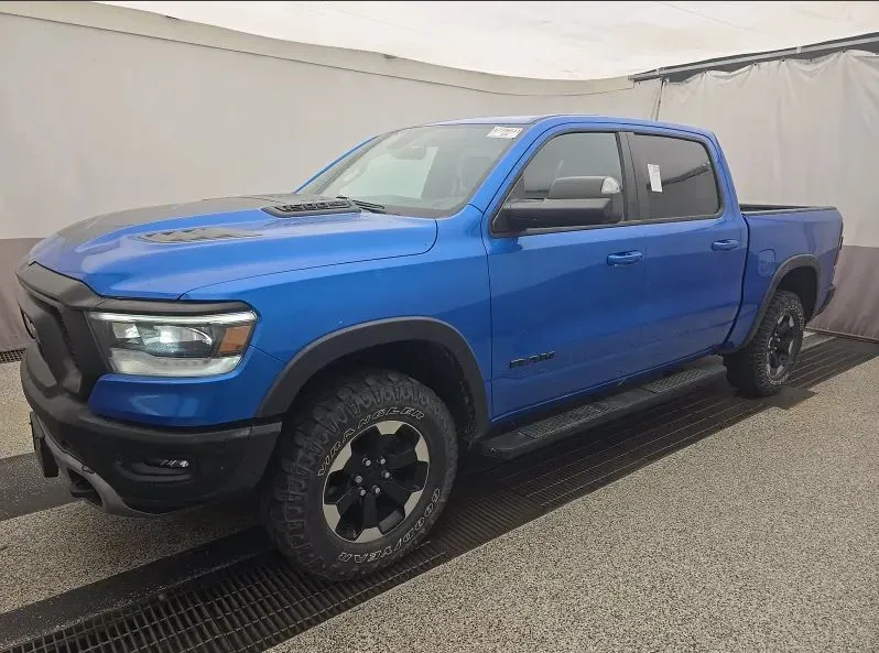 Blue 2020 Ram 1500 Crew Cab Rebel Pickup 4D 5 1/2 ft for sale in Fredericksburg, VA