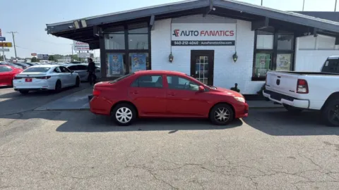Red 2010 Toyota Corolla LE Sedan 4D for sale in Fredericksburg, VA