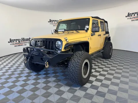 Brown 2014 Jeep Wrangler Unlimited Willys for sale in Salisbury, NC