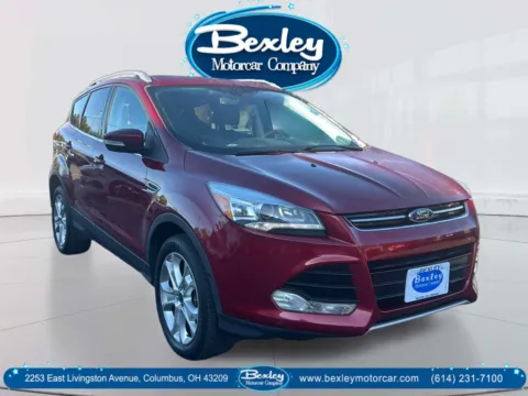 Orange 2016 Ford Escape Titanium for sale in Columbus, OH