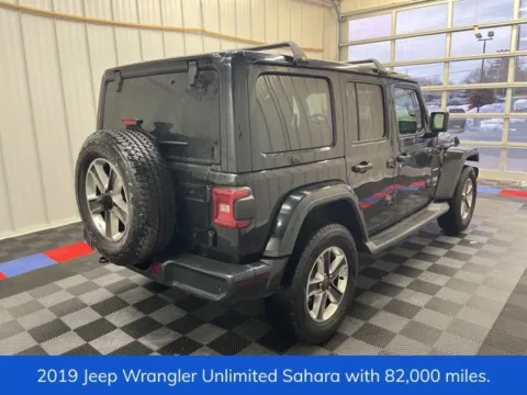 Another view of 2019 Jeep Wrangler Unlimited Sahara for sale in Syracuse, NY at Candy Cars