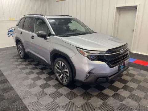 Photos of 2025 Subaru Forester Hybrid Touring for sale in Syracuse, NY at Candy Cars