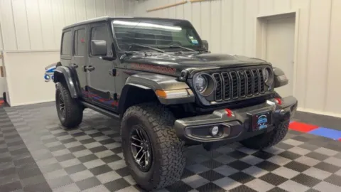 Photos of 2024 Jeep Wrangler Rubicon for sale in Syracuse, NY at Candy Cars