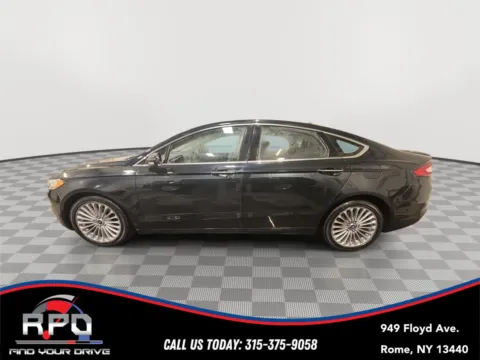 Photos of 2014 Ford Fusion Titanium for sale in Rome, NY at Rome Preowned Auto Sales