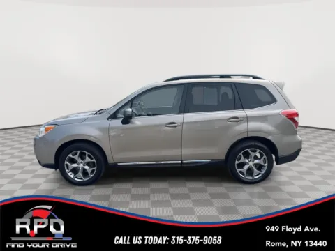 Photos of 2016 Subaru Forester 2.5i Touring for sale in Rome, NY at Rome Preowned Auto Sales
