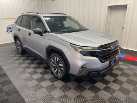 Photos of 2025 Subaru Forester Hybrid Touring for sale in Syracuse, NY at Candy Cars