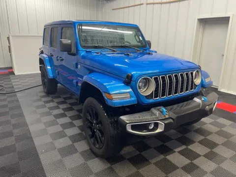 Photos of 2024 Jeep Wrangler Sahara 4xe for sale in Syracuse, NY at Candy Cars