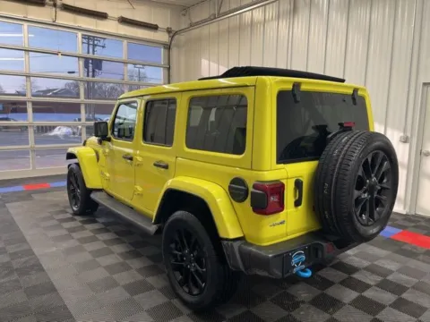 More photos of 2022 Jeep Wrangler Unlimited Sahara 4xe at Candy Cars, NY