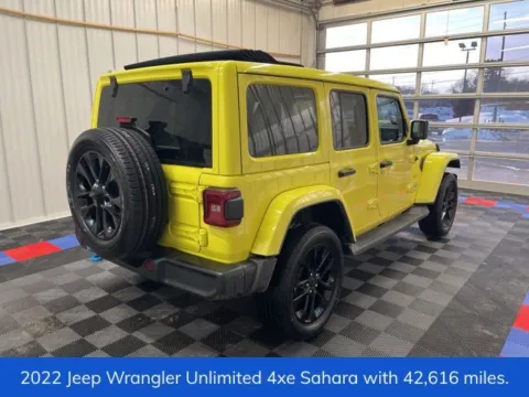 Another view of 2022 Jeep Wrangler Unlimited Sahara 4xe for sale in Syracuse, NY at Candy Cars
