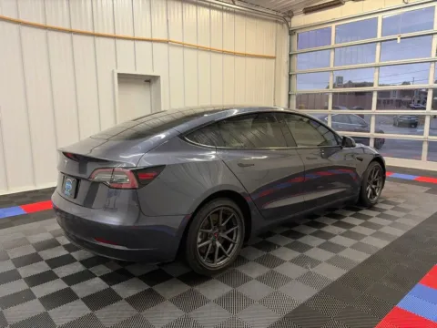 Another view of 2021 Tesla Model 3 Standard Range Plus for sale in Syracuse, NY at Candy Cars