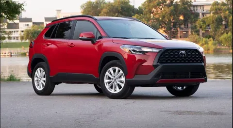 Red 2025 Toyota Corolla Cross LE for sale in Ballwin, MO