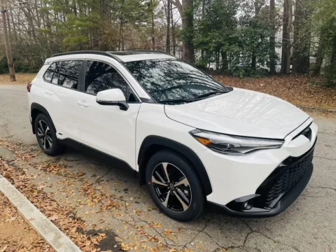 White 2024 Toyota Corolla Cross Hybrid XSE for sale in Ballwin, MO