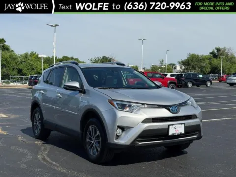 Silver 2016 Toyota RAV4 Hybrid XLE for sale in Ballwin, MO