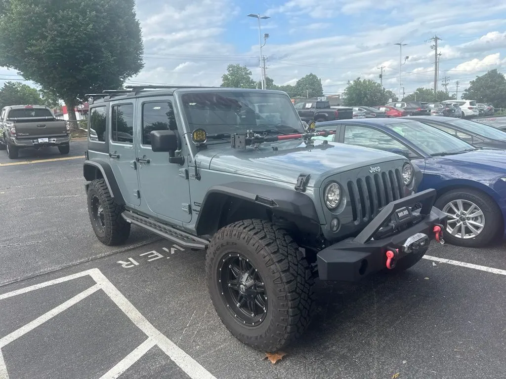 Blue 2015 Jeep Wrangler Unlimited Sport for sale in Ballwin, MO