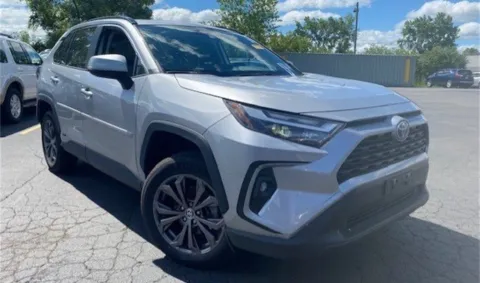 Silver 2023 Toyota RAV4 Hybrid XLE Premium for sale in Ballwin, MO