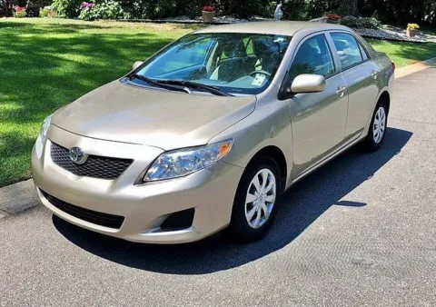 Tan 2010 Toyota Corolla LE for sale in Ballwin, MO
