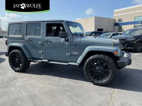 Gray 2014 Jeep Wrangler Unlimited Sahara for sale in Kansas City, MO