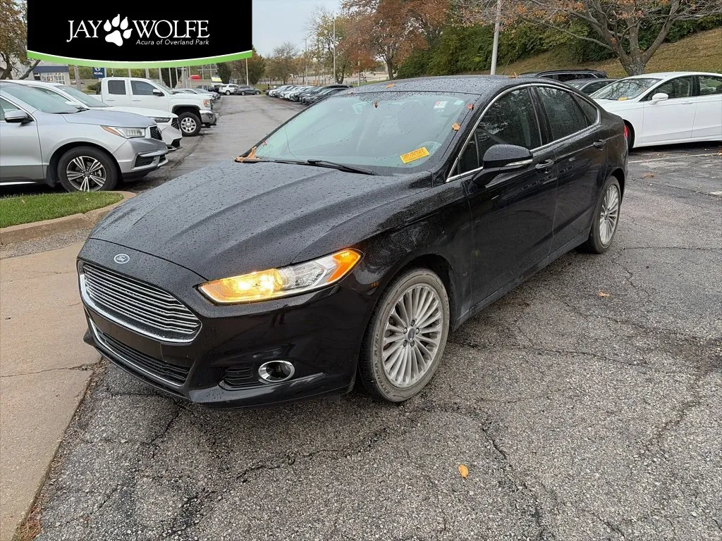 Used 2016 Ford Fusion Titanium with VIN 3FA6P0K98GR390394 for sale in Kansas City