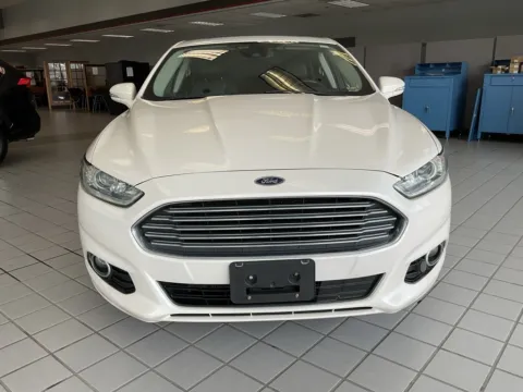 Photos of 2014 Ford Fusion Titanium for sale in Kansas City, MO at Jay Wolfe Auto Outlet