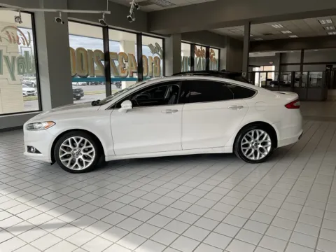 More photos of 2014 Ford Fusion Titanium at Jay Wolfe Auto Outlet, MO