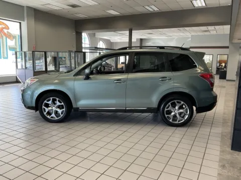 More photos of 2015 Subaru Forester 2.5i Touring at Jay Wolfe Auto Outlet, MO