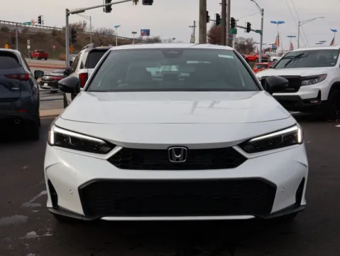 Photos of 2026 Honda Civic Sedan Hybrid Sport Touring for sale in Kansas City, MO at Jay Wolfe Honda