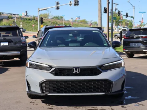Photos of 2026 Honda Civic Sedan Hybrid Sport Touring for sale in Kansas City, MO at Jay Wolfe Honda