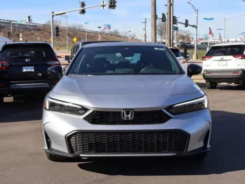 Photos of 2026 Honda Civic Sedan Hybrid Sport Touring for sale in Kansas City, MO at Jay Wolfe Honda