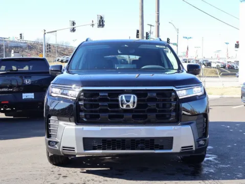 Photos of 2026 Honda Pilot Touring S for sale in Kansas City, MO at Jay Wolfe Honda