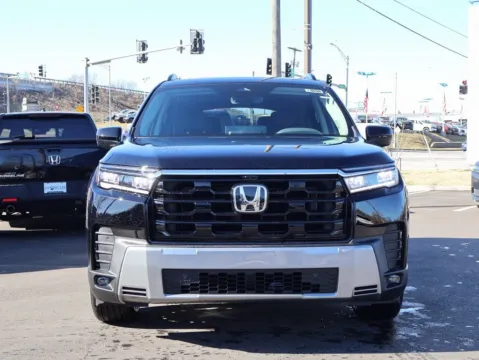 Photos of 2026 Honda Pilot Touring S for sale in Kansas City, MO at Jay Wolfe Honda