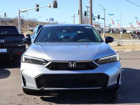 Photos of 2026 Honda Civic Sedan Hybrid Sport Touring for sale in Kansas City, MO at Jay Wolfe Honda