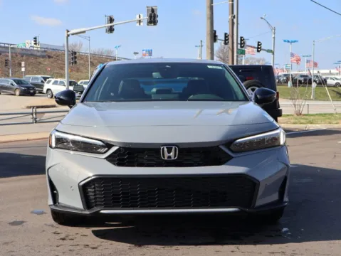 Photos of 2026 Honda Civic Sedan Hybrid Sport Touring for sale in Kansas City, MO at Jay Wolfe Honda
