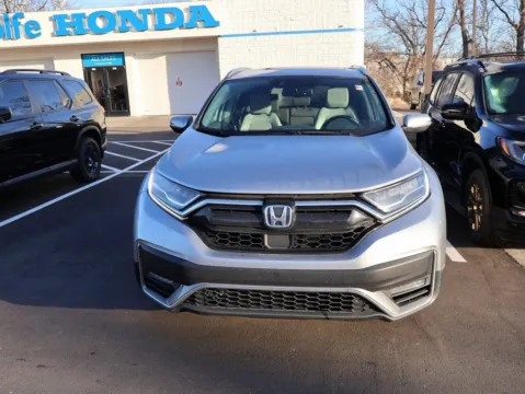 Photos of 2022 Honda CR-V Hybrid Touring for sale in Kansas City, MO at Jay Wolfe Honda