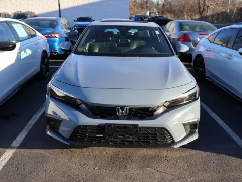 Photos of 2024 Honda Civic Hatchback Sport Touring for sale in Kansas City, MO at Jay Wolfe Honda