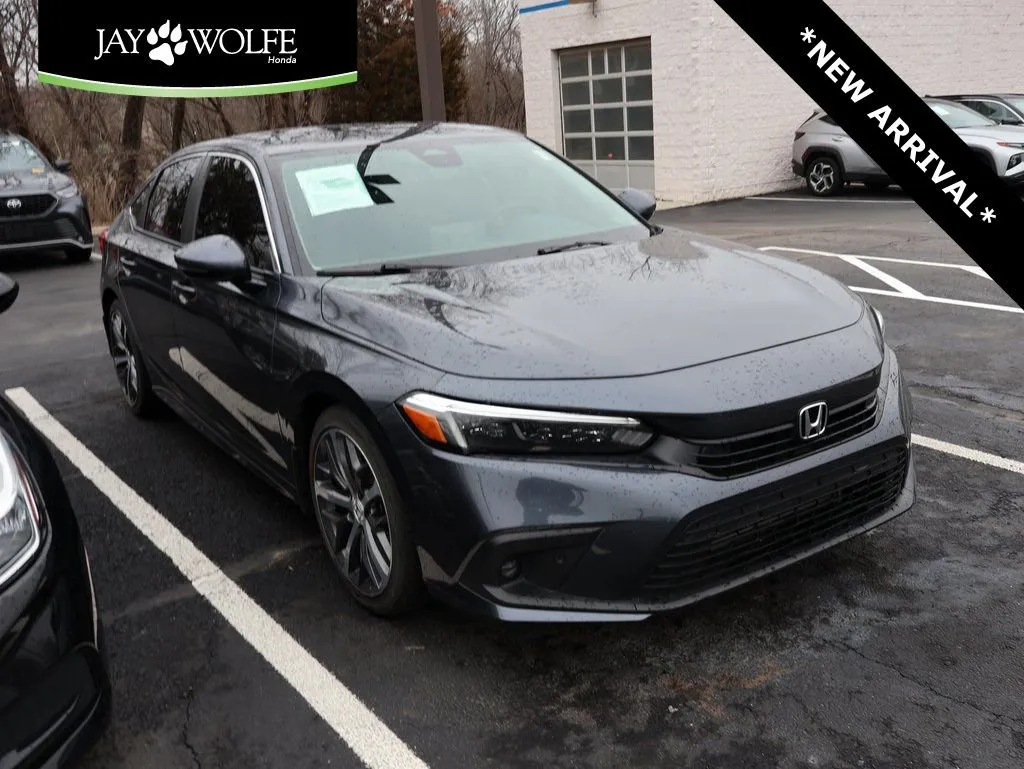 Used 2022 Honda Civic Touring with VIN 2HGFE1F91NH310184 for sale in Kansas City