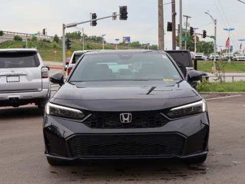 Photos of 2026 Honda Civic Sedan Hybrid Sport Touring for sale in Kansas City, MO at Jay Wolfe Honda