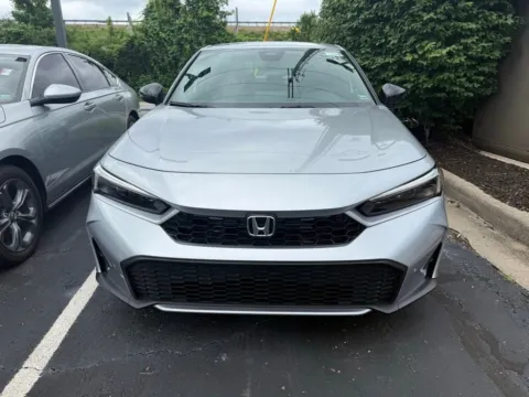 Photos of 2026 Honda Civic Sedan Hybrid Sport Touring for sale in Kansas City, MO at Jay Wolfe Honda