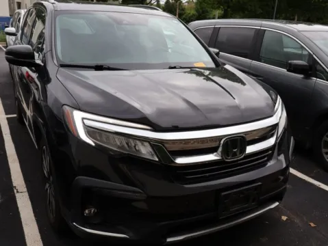 Photos of 2022 Honda Pilot Touring 7-Passenger for sale in Kansas City, MO at Jay Wolfe Honda
