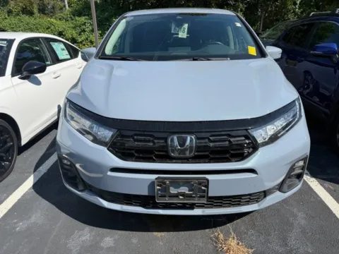 Photos of 2025 Honda Odyssey Touring for sale in Kansas City, MO at Jay Wolfe Honda