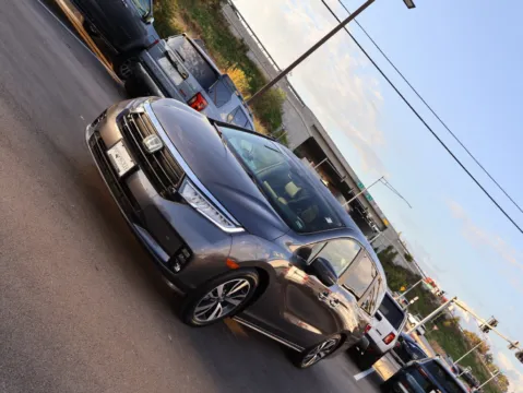 Another view of 2024 Honda Odyssey Touring for sale in Kansas City, MO at Jay Wolfe Honda