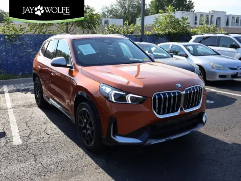Orange 2023 BMW X1 xDrive28i for sale in Kansas City, MO