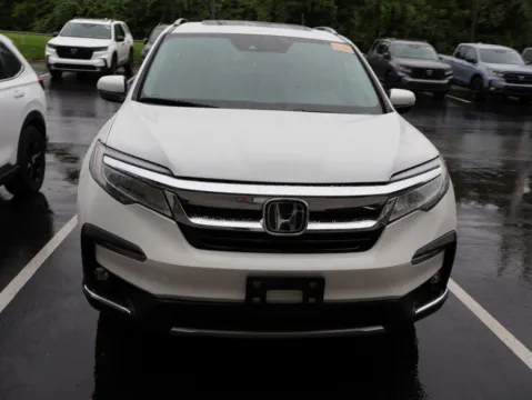 Photos of 2022 Honda Pilot Touring 7-Passenger for sale in Kansas City, MO at Jay Wolfe Honda