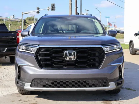 Photos of 2025 Honda Pilot Touring+ for sale in Kansas City, MO at Jay Wolfe Honda