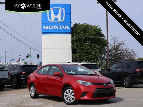 Red 2015 Toyota Corolla LE for sale in Kansas City, MO