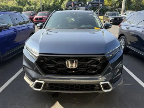 Photos of 2023 Honda CR-V Hybrid Sport Touring for sale in Kansas City, MO at Jay Wolfe Honda
